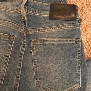Levi’s silver high skinny jeans 26x32